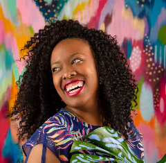Jessie_Raulet-EttaVee A headshot of Jessi Raulet. EttaVee Artist and Creative Director